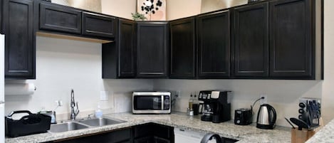 Coffee/tea maker, fridge, microwave, oven