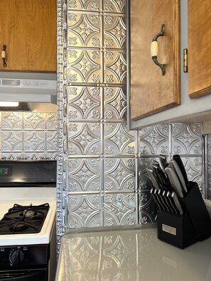 Microwave, oven, stovetop, dining tables