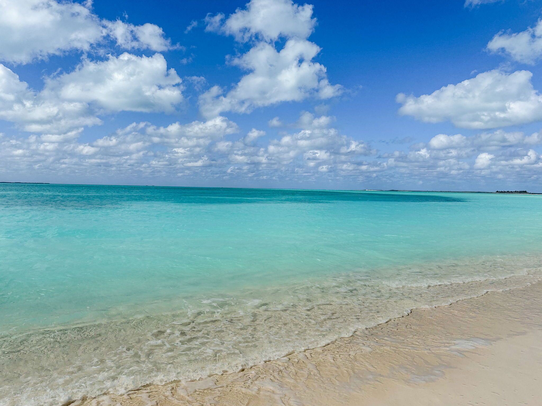 On the beach, sun loungers, beach towels