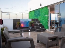 Family Penthouse, City View, Poolside | Terrace/patio
