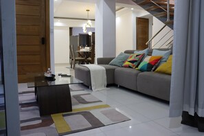 Family Penthouse, City View, Poolside | Living area - Sejour's Penthouse (Santo Domingo Este)