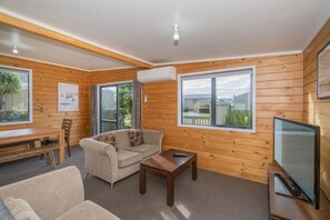 Family Chalet, 3 Bedrooms | Living area - Cooks Beach Resort (Cooks Beach)