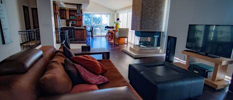 Smart TV, fireplace, DVD player, books