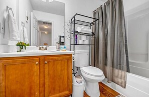 Hair dryer, towels, soap, shampoo