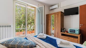 1 dormitori, planxa i posts de planxar, wifi gratuïta i roba de llit