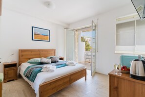 1 chambre, fer et planche à repasser, Wi-Fi gratuit, draps fournis