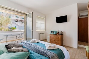 1 chambre, fer et planche à repasser, Wi-Fi gratuit, draps fournis
