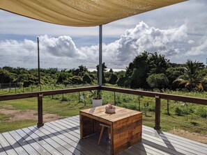 Outdoor dining - Playa Negra--Luxury Container Home--Casa NoSe' (Vieques)