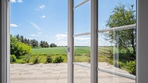 A view from a window with a clear sky and greenery outside. - 2 bedroom nice home in Hemmet (Hemmet)