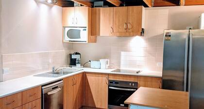 Winter hideaway loft style unit with Fireplace, Billiard table and Bath.