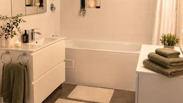 Hair dryer, towels, soap, toilet paper