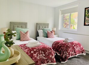 3 bedrooms, desk, iron/ironing board, travel cot