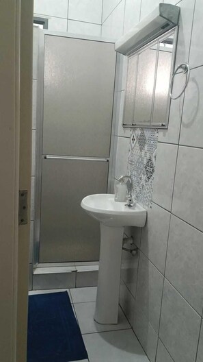 Shower, free toiletries, towels, soap
