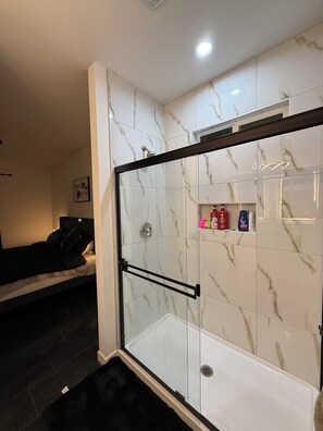 Shower, hair dryer, towels, soap