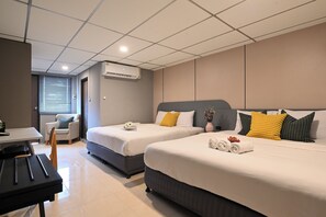 Deluxe Triple City View Room | Desk, laptop workspace, soundproofing, free WiFi