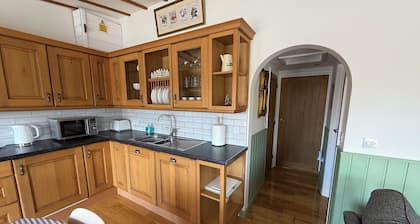 Riverside 2 bedroom lodge. Fishing straight off the decking.