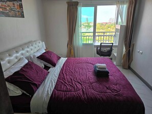 Departamento Deluxe, balcón, vista al mar | 1 habitación, tabla de planchar con plancha y wifi gratis 