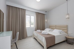 Villa | 2 dormitorios y tabla de planchar con plancha