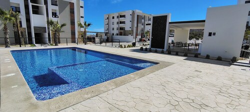 Charming 2-bedroom apartment in Los Cabos with WiFi, AC, Swimming Pool and more.