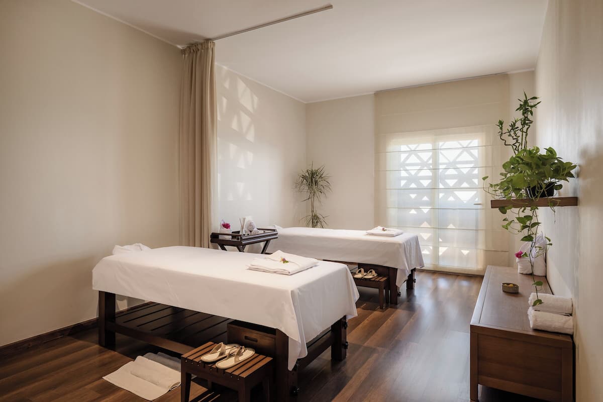 Hypo-allergenic bedding, down duvets, minibar, in-room safe