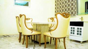 Family Apartment, Balcony, City View | Dining room