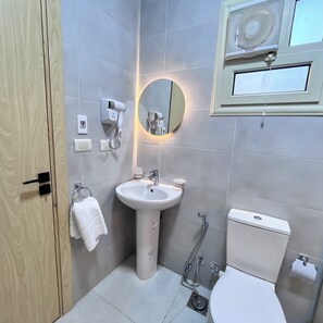 Jetted bath, hair dryer, towels, soap