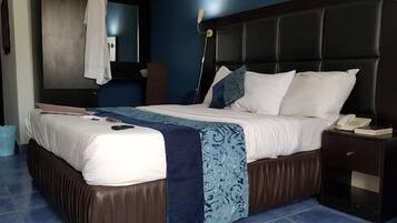 Deluxe Room, Balcony, City View | Desk, laptop workspace, blackout drapes, soundproofing