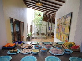 Daily local cuisine breakfast (USD 15 per person)