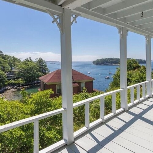 Ocean views, private beach, garden patio, red clay tennis, dock access, WiFi