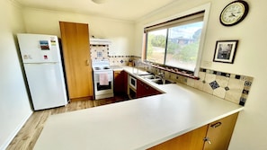 Coffee/tea maker, fridge, microwave, oven - A charming family-friendly retreat nestled in the tranquil heart of Venus Bay (Venus Bay)