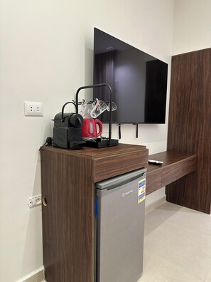 Premium bedding, memory-foam beds, minibar, in-room safe