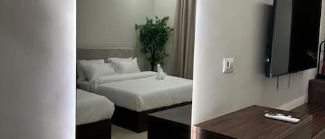 Literie de qualité supérieure, matelas mémoire de forme, minibar