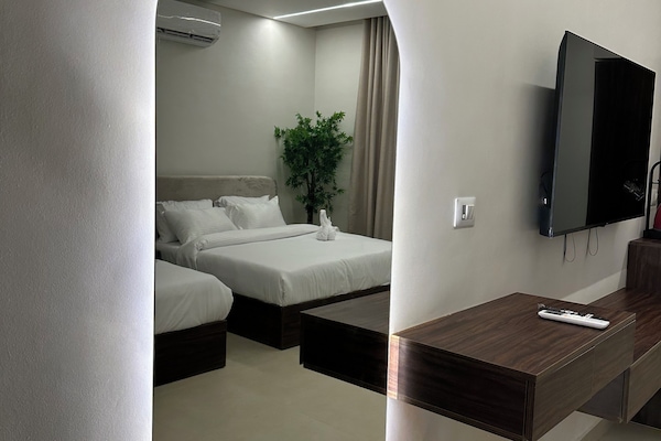 Premium bedding, memory-foam beds, minibar, in-room safe