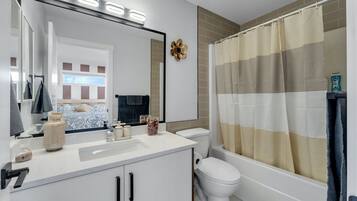 Hair dryer, towels, soap, shampoo