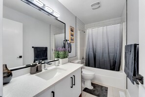 Hair dryer, towels, soap, shampoo