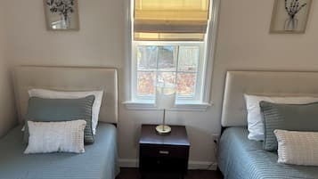 2 habitaciones, tabla de planchar con plancha, cuna de viaje y wifi