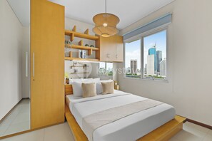 Apartment, 1 Queen Bed, City View | 1 bedroom, desk, laptop workspace, iron/ironing board - Soori by Kozystay - Thamrin (Jakarta)