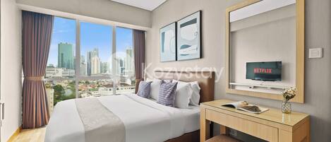 Apartment, 2 Bedrooms, City View | 2 bedrooms, desk, laptop workspace, iron/ironing board