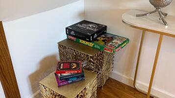 A staircase with three steps, each with a different book on top.