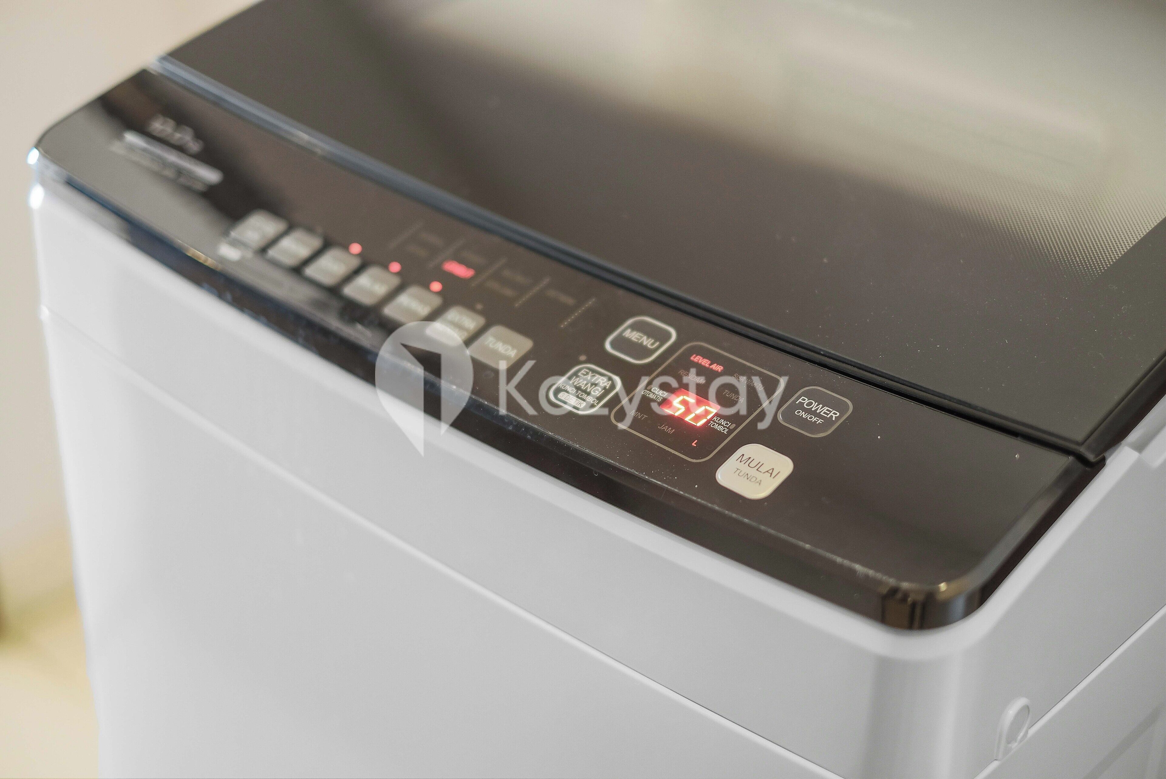 A close-up of a printer's control panel with various buttons and indicators.