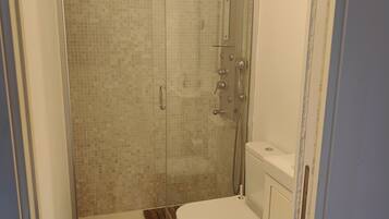 Hair dryer, towels, soap, shampoo