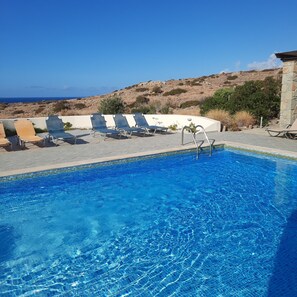 Outdoor pool, a heated pool - 5-bedroom villa with heated pool, sea and mountain views, 5 minutes from the center of town (Makry Gialos)