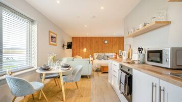 Fridge, oven, cookware/dishes/utensils