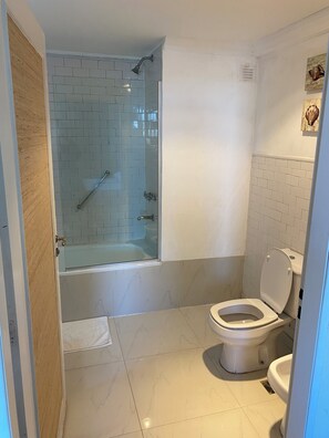 Bidet, towels, soap, shampoo