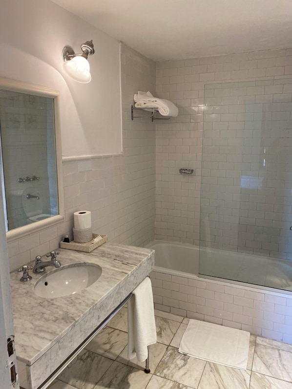 Bidet, towels, soap, shampoo