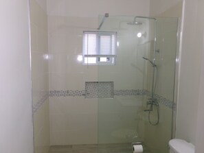 Shower, towels, soap, toilet paper - Charming, newly constructed, 2-bedroom house in gated community/modern amenities (Negril)