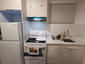 Fridge, microwave, electric kettle, toaster