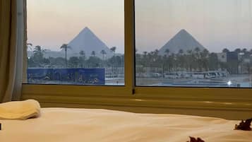 Premium bedding, down duvets, pillow-top beds, free minibar