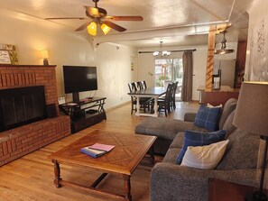 Smart TV, fireplace, DVD player, books