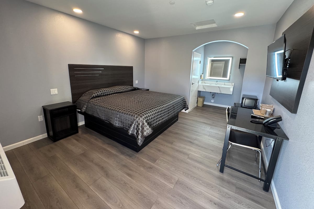 Habitación individual Deluxe, no fumadores | Escritorio, wifi gratis, ropa de cama